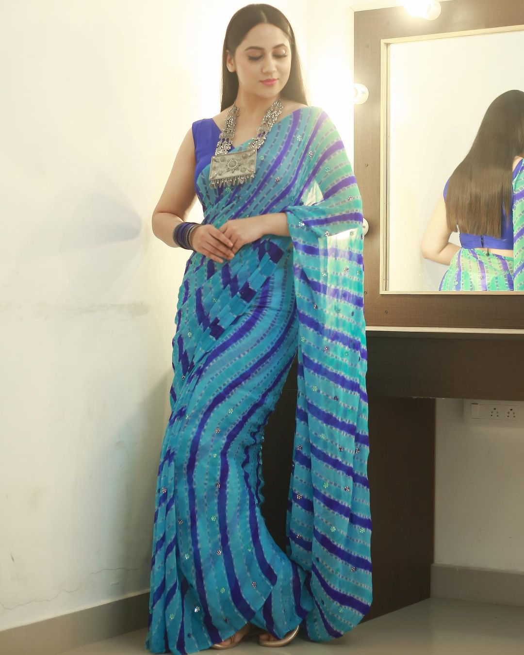 Malayalam Actress Miya George in Sleeveless Blue Saree